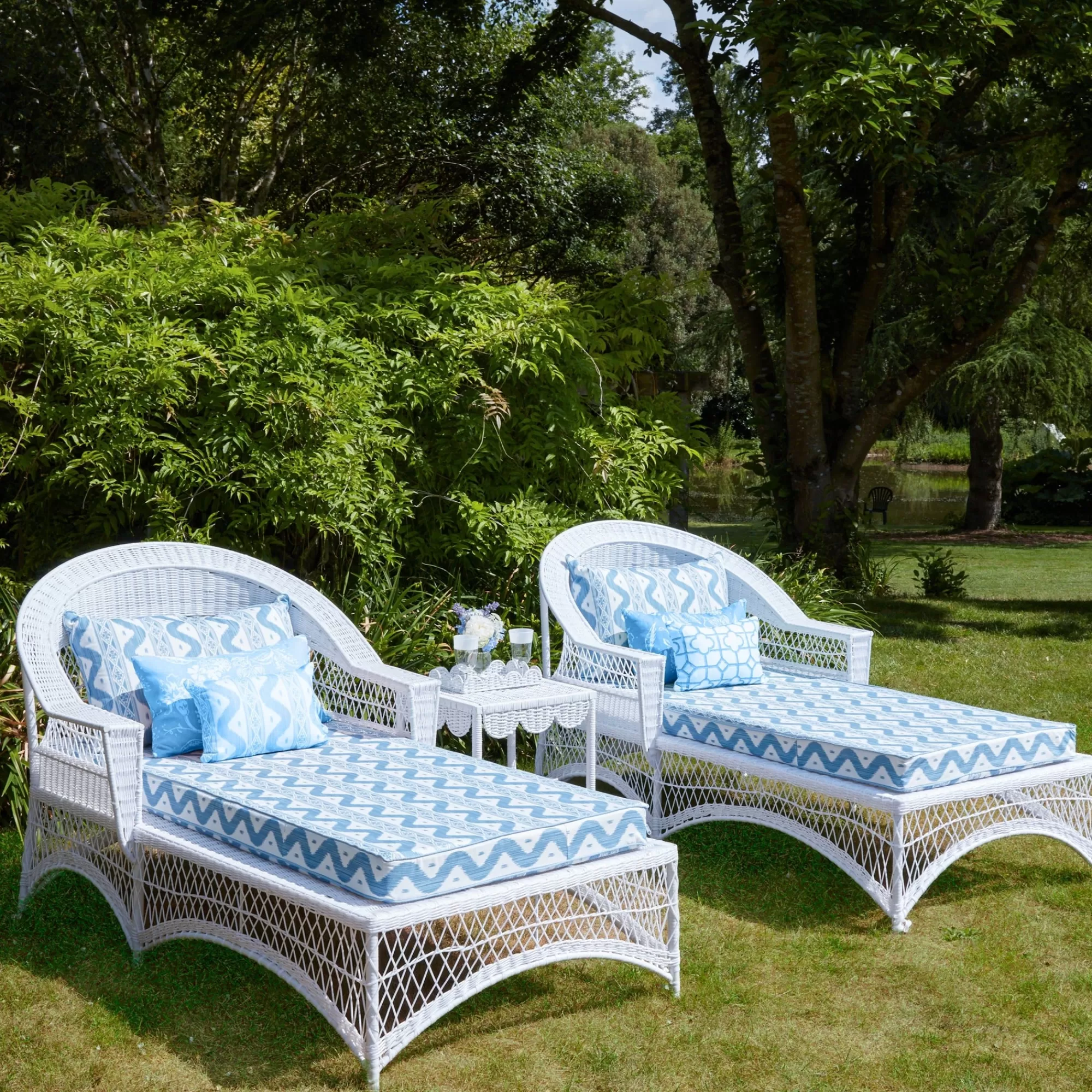 Outlet White Rattan Sun Lounger With Blue Ikat Cushion Rattan Furniture